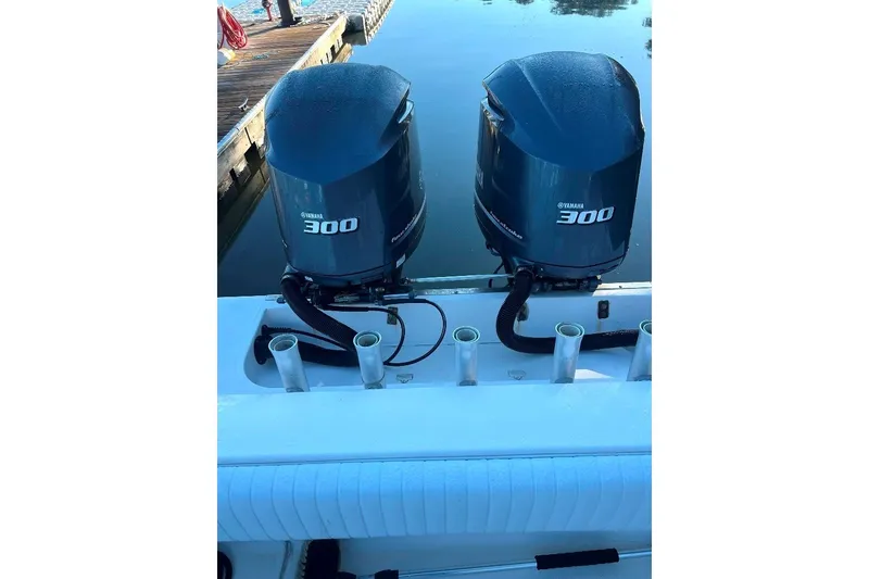 Slide: The Image of Twin Yamaha 300 engines on a 2008 McKee Craft Freedom 28 FS/CC boat at dock. - 7