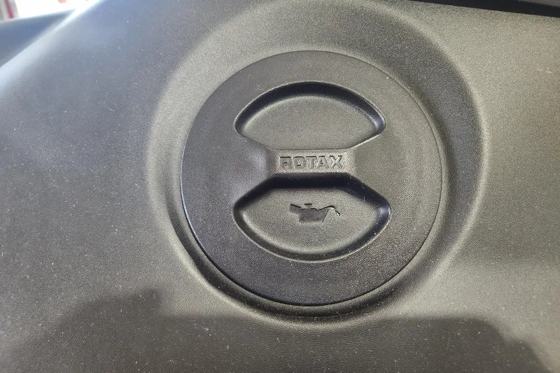 Slide: The Image of Close-up of 2024 Seadoo SPARK TRIXX 1 UP Rotax engine cover. - 19