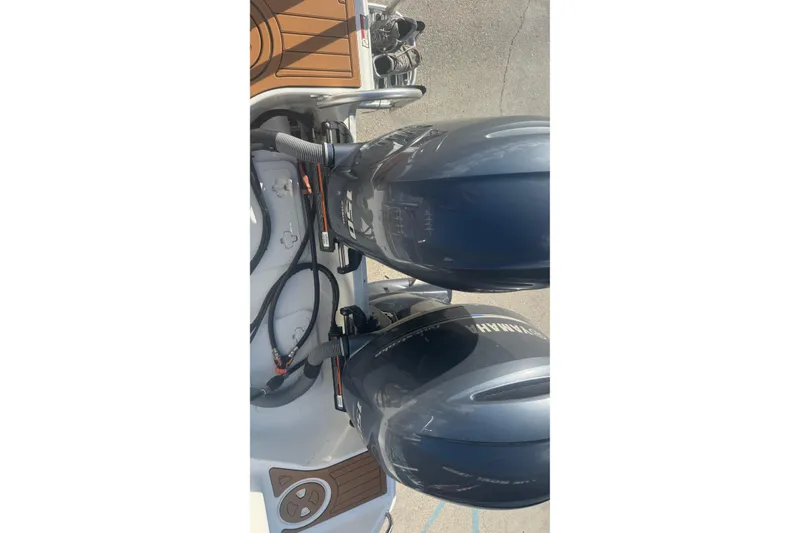 Slide: The Image of 2022 Sea Hunt Gamefish 25 with dual Yamaha outboard motors, top view. - 9