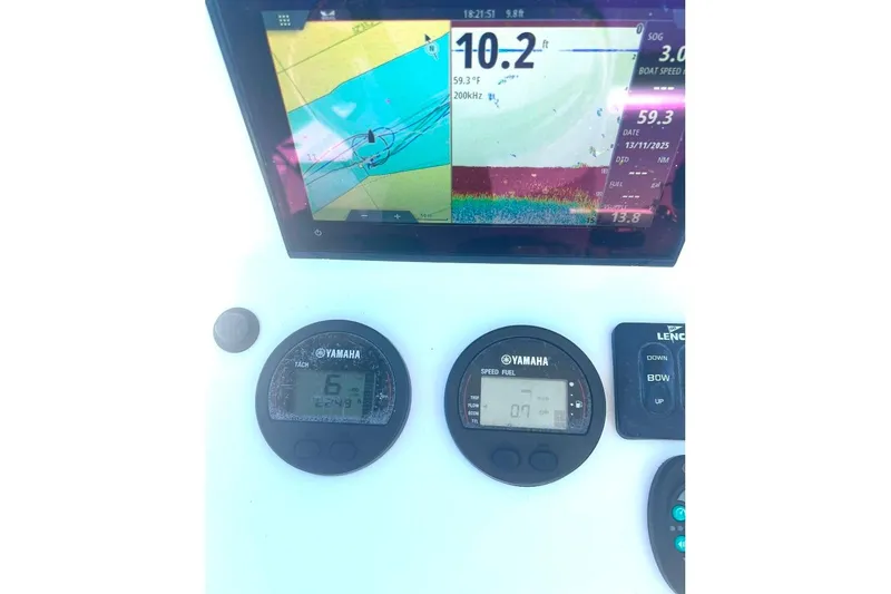 Slide: The Image of Boat dashboard with Yamaha gauges and navigation display, BlackJack 224, 2015 model. - 31