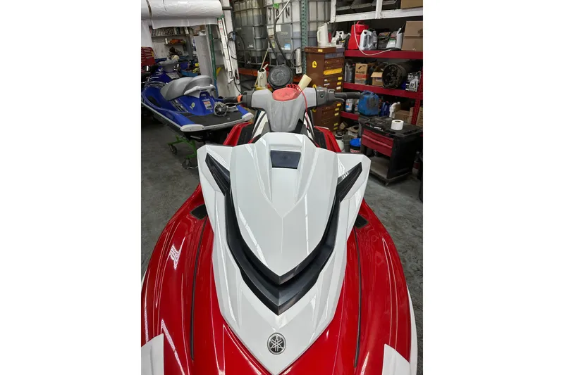 Slide: The Image of 2018 Yamaha WaveRunner GP1800 in a workshop, red and white design. - 3
