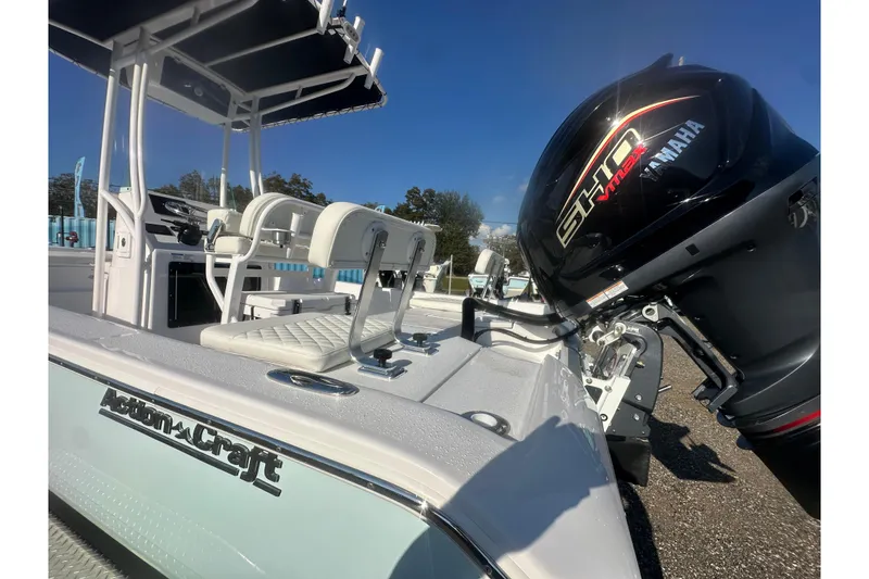 Slide: The Image of 2026 Action Craft 22 Bay boat with Yamaha SHO VMAX engine, white seating, and sleek design. - 21