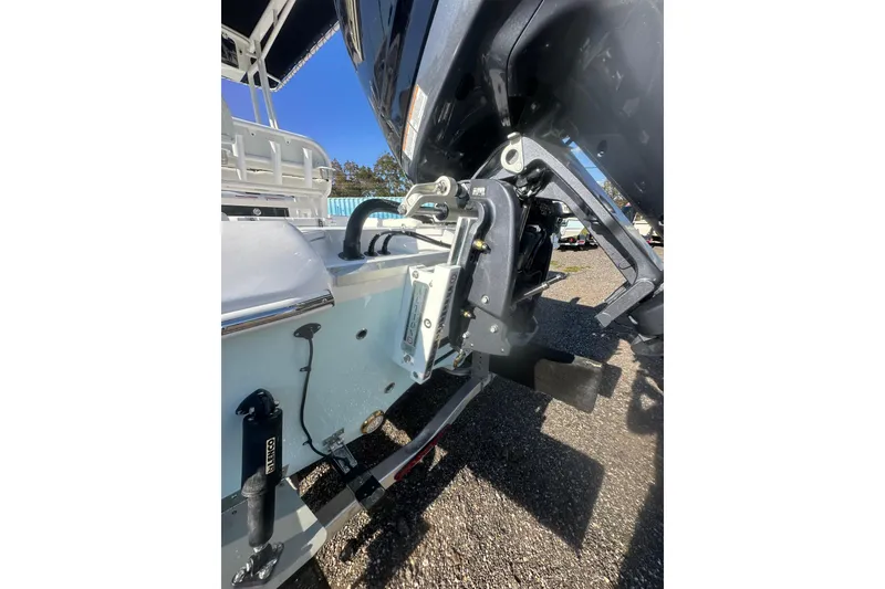 Slide: The Image of 2026 Action Craft 22 Bay boat with motor and hydraulic components. - 23