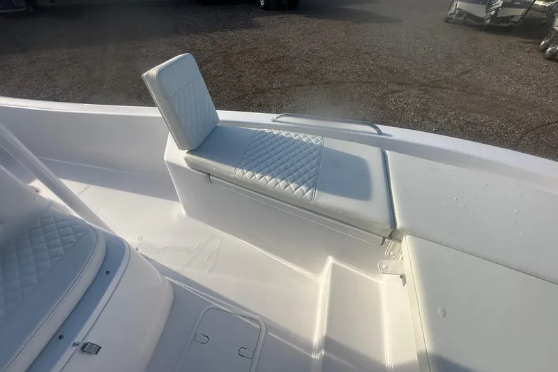 Slide: The Image of 2026 Action Craft 22 Bay boat interior with cushioned seating and storage. - 30
