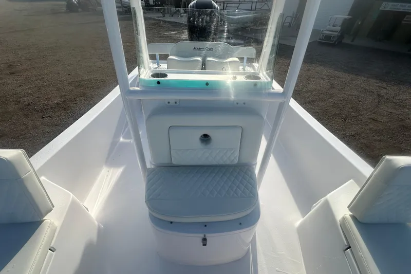 Slide: The Image of 2026 Action Craft 22 Bay boat interior with seating and console, showcasing modern design. - 31