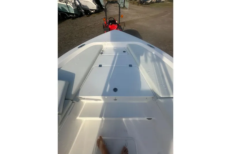 Slide: The Image of 2026 Action Craft 22 Bay boat interior with seating and storage compartments. - 36