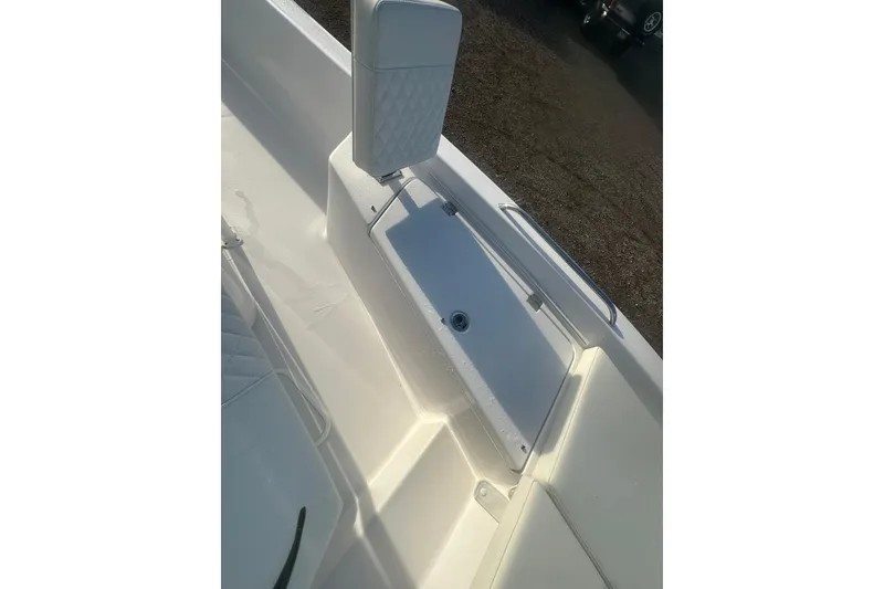 Slide: The Image of 2026 Action Craft 22 Bay boat interior with open storage compartment. - 40