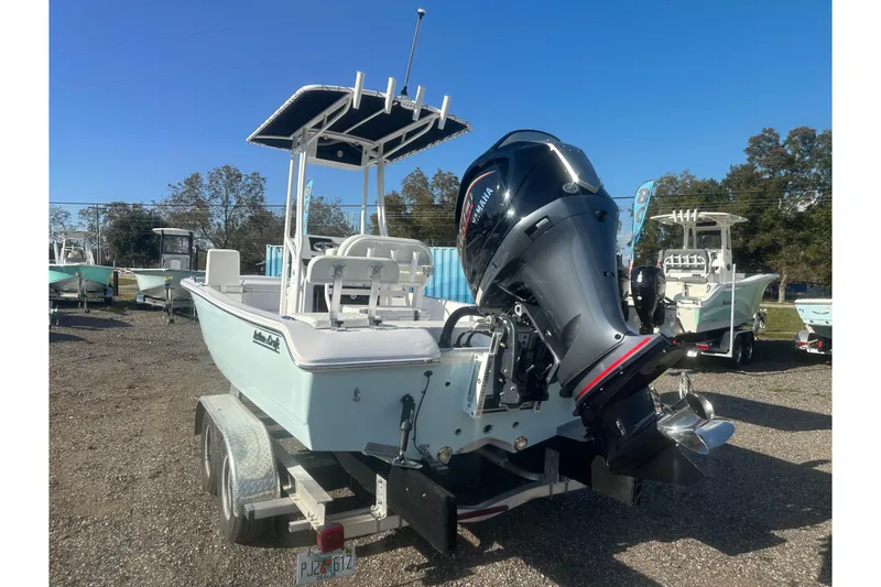 Slide: The Image of 2026 Action Craft 22 Bay boat with Yamaha outboard motor on trailer. - 5