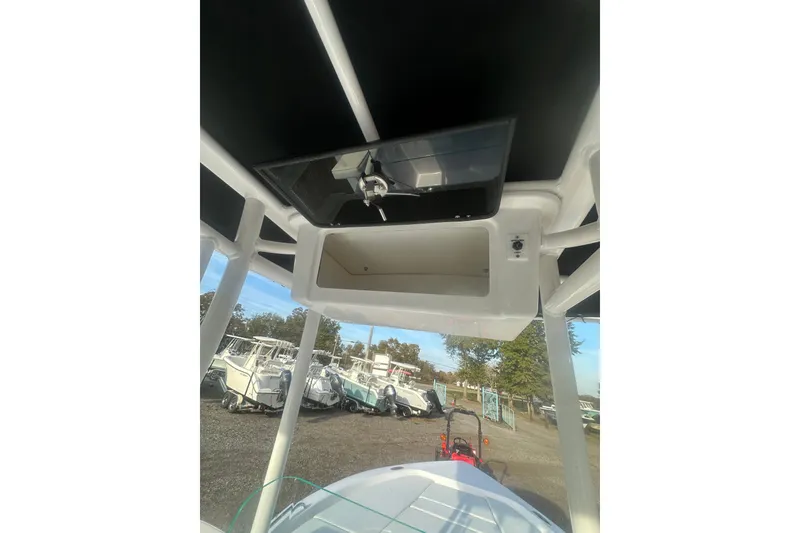 Slide: The Image of 2026 Action Craft 22 Bay boat interior with storage compartment and overhead view. - 62