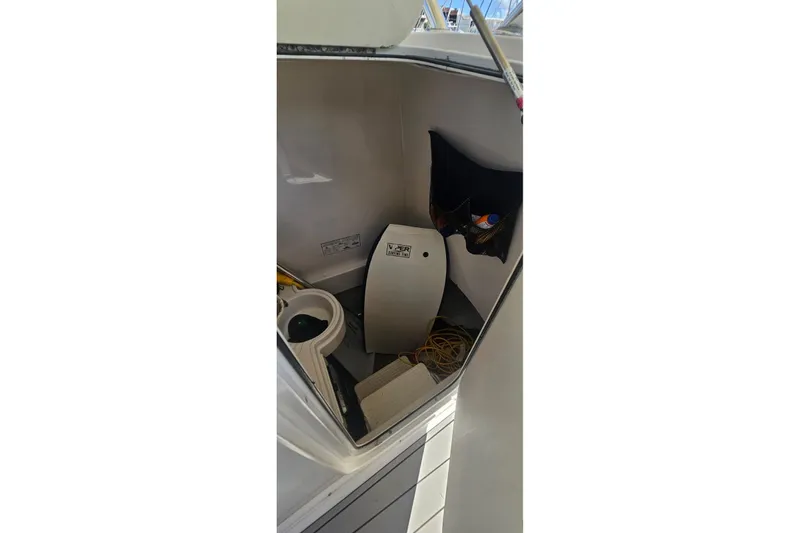 Slide: The Image of Interior of 2007 Southport 26 Center Console boat with storage and equipment. - 5