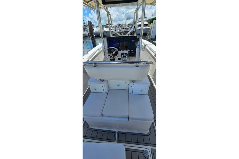 Slide: The Image of 2007 Southport 26 Center Console boat interior with seating and control panel. - 9