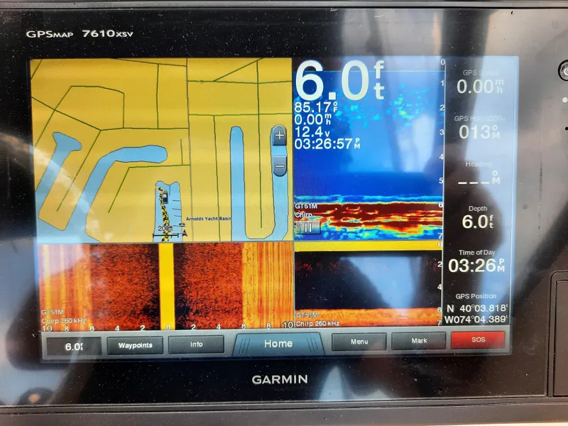 Slide: The Image of Garmin GPS display on 2016 Grady-White Freedom 205, showing depth and navigation data. - 17