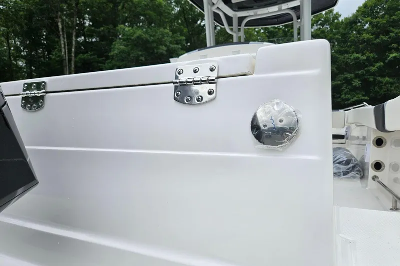Slide: The Image of 2025 Robalo R230 Center Console boat detail with stainless steel hinges and fittings. - 25