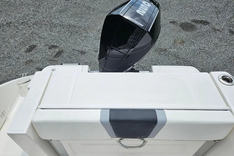 Slide: The Image of 2025 Robalo R230 Center Console boat with Mercury outboard motor, rear view. - 27