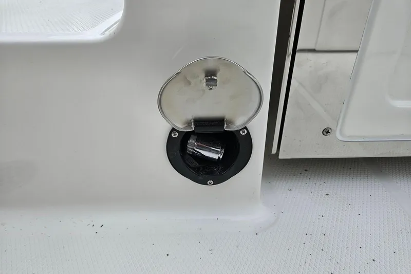 Slide: The Image of Fuel cap on 2025 Robalo R230 Center Console boat. - 34