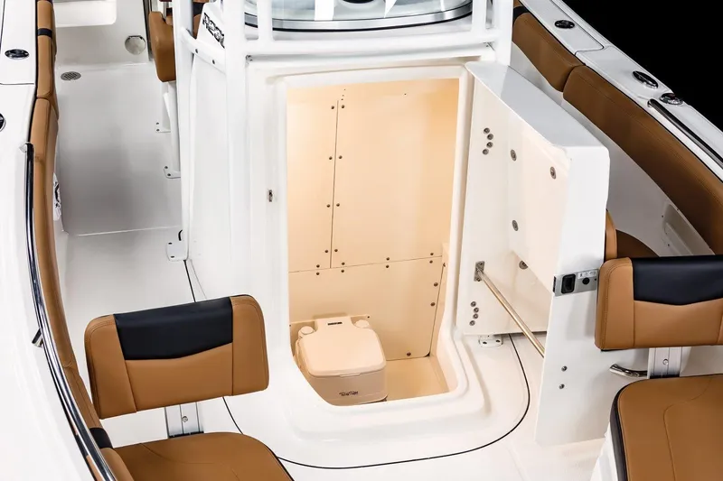 Slide: The Image of Manufacturer Provided Image: 2025 Robalo R230 Center Console boat interior with open storage compartment. - 44