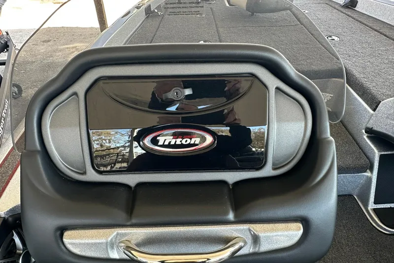Slide: The Image of 2026 Triton 179 TrX dashboard with logo and sleek design. - 18