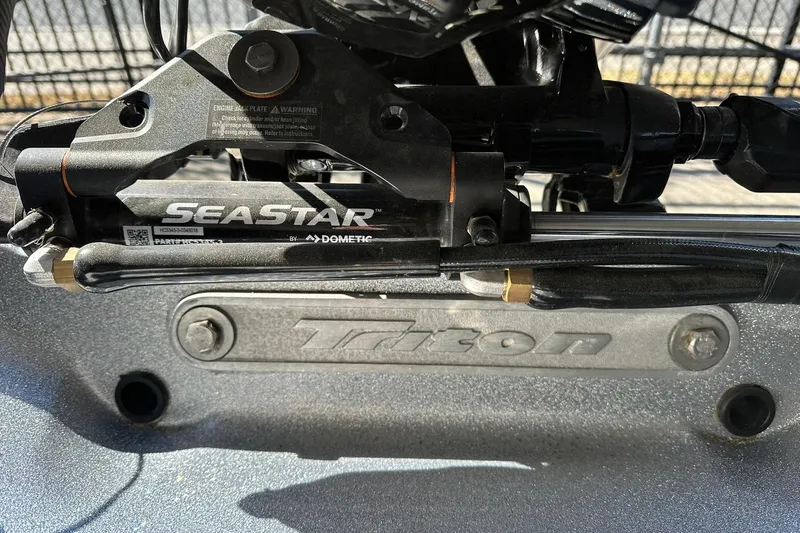 Slide: The Image of Close-up of 2026 Triton 179 TrX boat with SeaStar hydraulic steering system. - 26