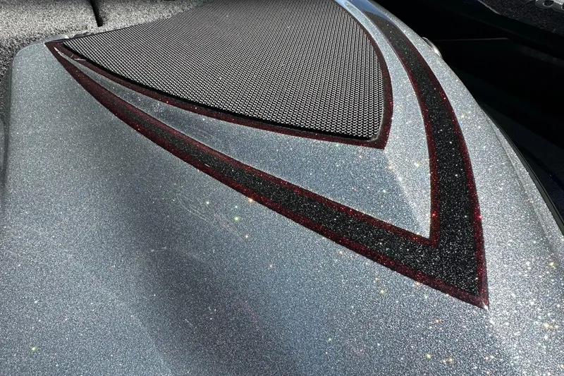 Slide: The Image of 2026 Triton 179 TrX boat with glittery silver finish and sleek design accents. - 28