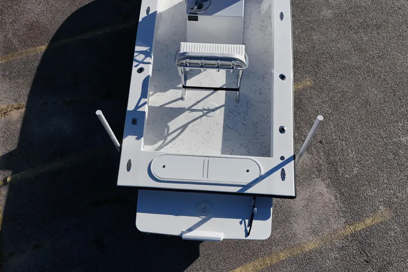 Slide: The Image of 2026 C-Hawk 23CC boat interior, featuring a clean deck and seating arrangement. - 9