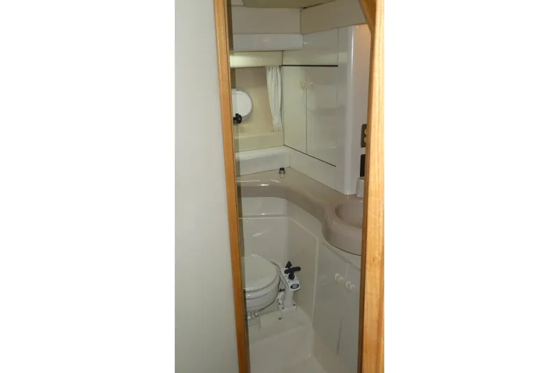 Slide: The Image of Bathroom interior of 1994 Bayliner 4388 Motor Yacht with compact design and fixtures. - 30