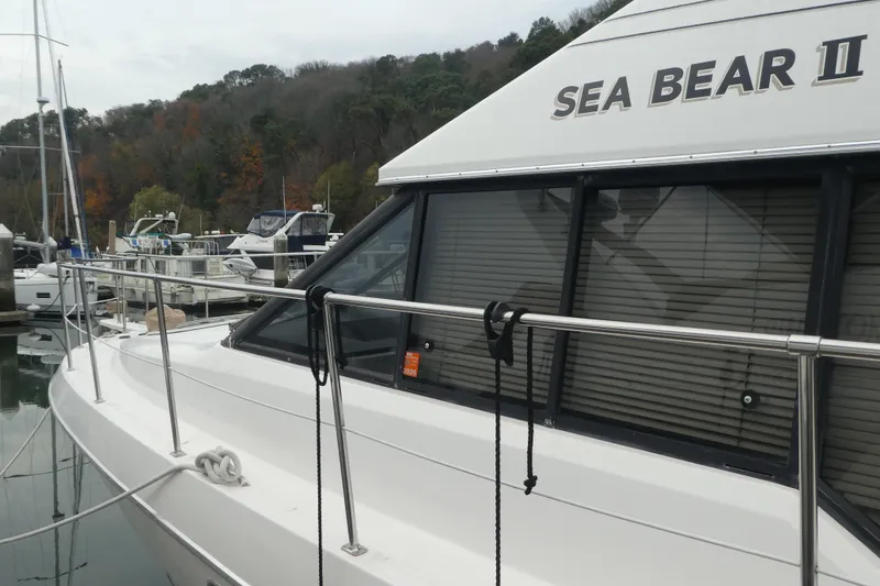Slide: The Image of 1994 Bayliner 4388 Motor Yacht "Sea Bear II" docked at marina. - 4
