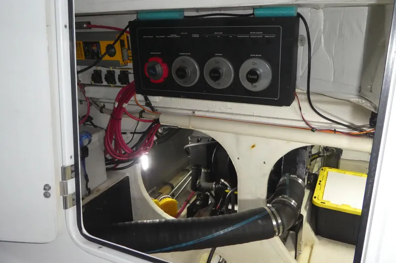 Slide: The Image of Engine room of 1994 Bayliner 4388 Motor Yacht with control panel and wiring. - 47