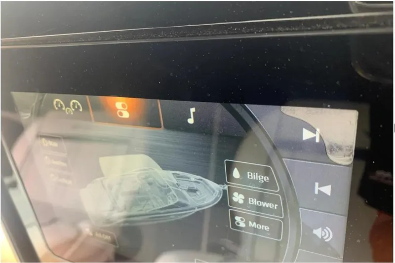 Slide: The Image of Control panel of a 2018 Sea Ray SLX 310 boat, displaying bilge and blower options. - 17