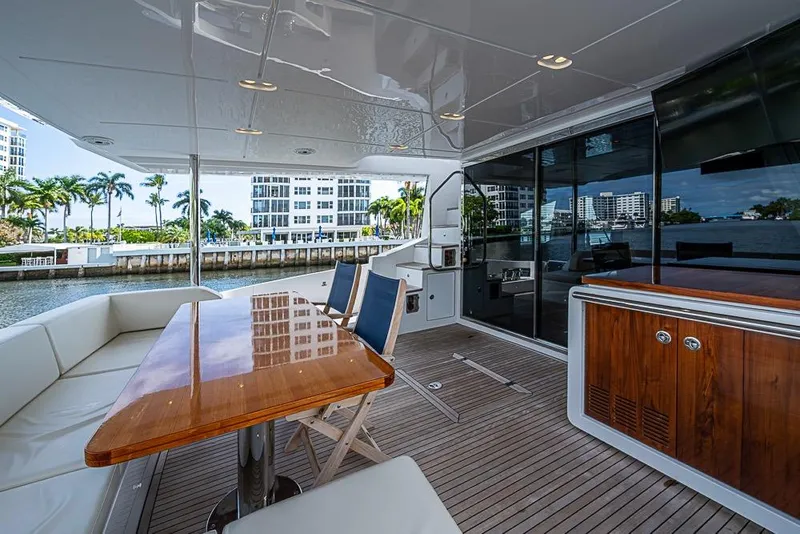 Slide: The Image of Luxurious 2017 Azimut 80 yacht deck with elegant seating and waterfront view. - 23