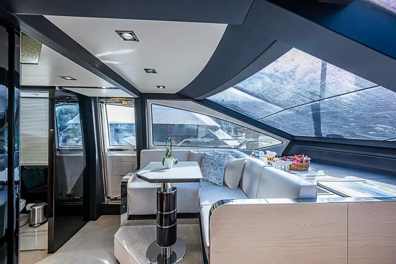 Slide: The Image of Luxurious interior of 2017 Azimut 80 yacht with modern seating and panoramic windows. - 58