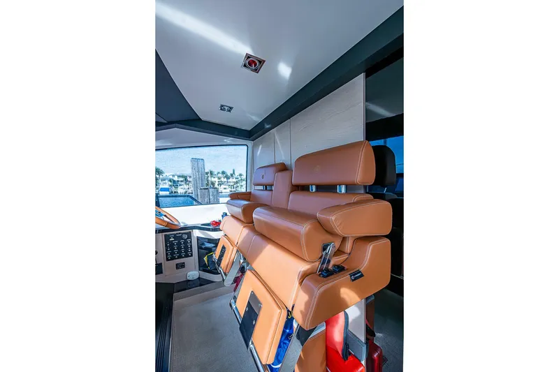 Slide: The Image of Luxurious interior of 2017 Azimut 80 yacht with tan leather seating. - 61