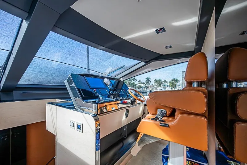 Slide: The Image of Luxurious helm of 2017 Azimut 80 yacht with leather seating and modern controls. - 62