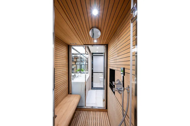 Slide: The Image of Luxurious wooden interior of 2017 Azimut 80 yacht bathroom with modern fixtures. - 91