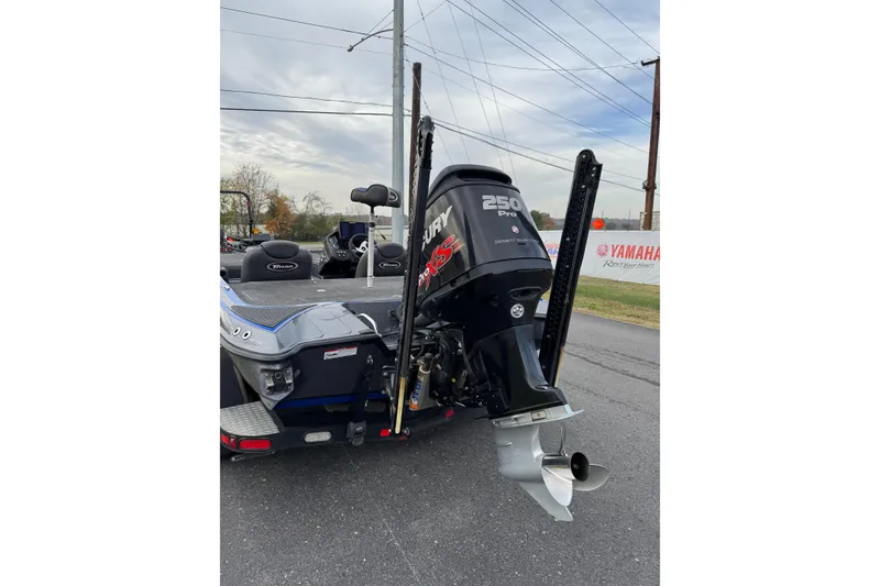 Slide: The Image of 2017 Triton 20 TrX Patriot boat with Mercury 250 Pro XS engine, parked outdoors. - 3