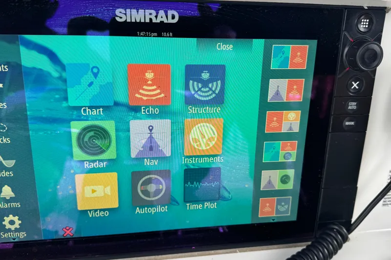 Slide: The Image of Simrad marine navigation display on 2005 Glacier Bay 260 Canyon Runner boat. - 13