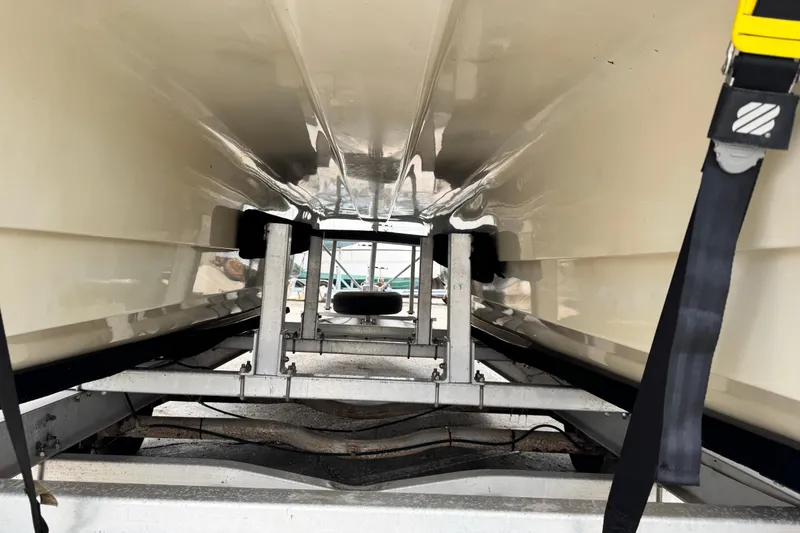 Slide: The Image of Underside view of 2005 Glacier Bay 260 Canyon Runner boat on trailer. - 16
