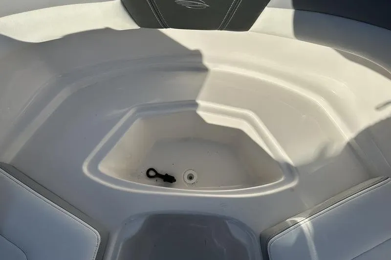 Slide: The Image of Interior view of 2022 Chaparral 23 SSi OB boat's seating area. - 23