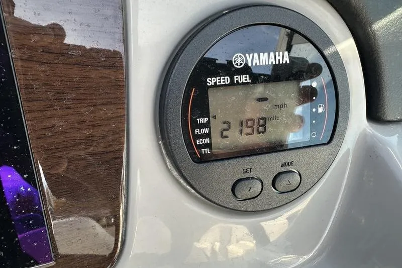 Slide: The Image of Yamaha speed fuel gauge on 2022 Chaparral 23 SSi OB boat dashboard. - 31