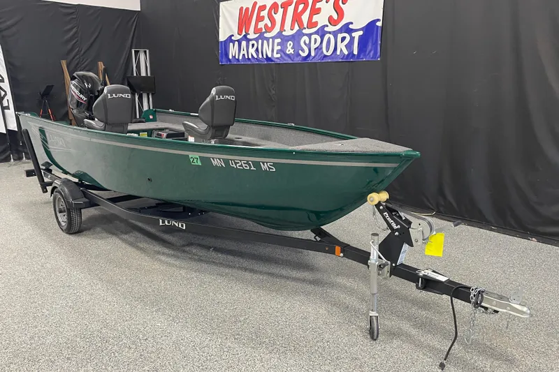 The Image of 2025 Lund 1650 Angler Tiller boat on trailer at Westre's Marine & Sport showroom. - 1
