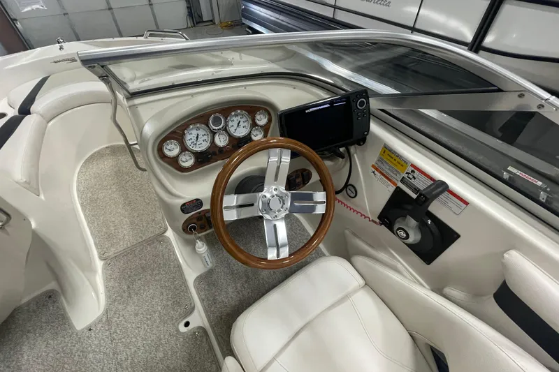 Slide: The Image of Dashboard of 2010 Glastron GT 185 with Humminbird Helix 7 display. - 11