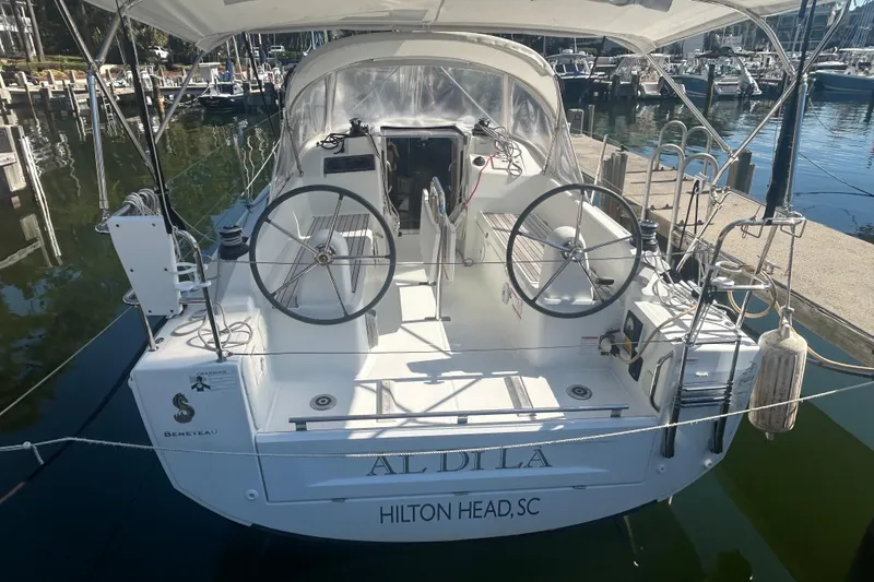 Slide: The Image of 2020 Beneteau Oceanis 30.1 sailboat docked at Hilton Head marina. - 2