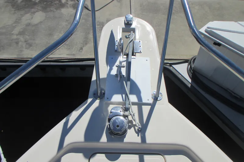 Slide: The Image of Bow of 2005 Mainship Pilot 34 Sedan with anchor and railing. - 41