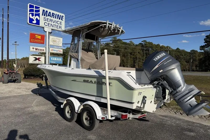 Slide: The Image of 2010 Sea Hunt Ultra 210 boat with Yamaha engine at Marine Service Center. - 3