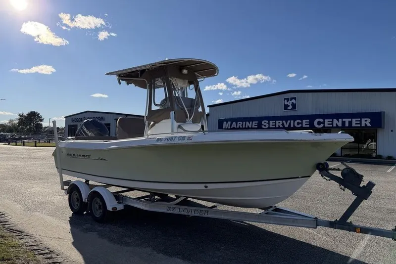 Slide: The Image of 2010 Sea Hunt Ultra 210 boat on trailer at Marine Service Center. - 5