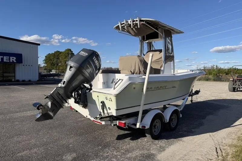 Slide: The Image of 2010 Sea Hunt Ultra 210 boat with Yamaha 150 engine on trailer. - 6