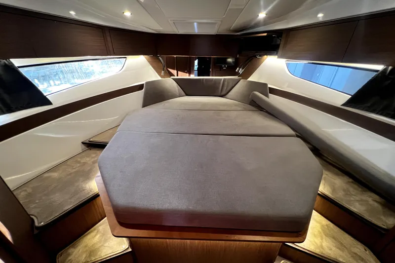 Slide: The Image of Luxurious interior cabin of 2023 Beneteau Antares 11 Fly yacht, featuring elegant design and comfortable seating. - 15