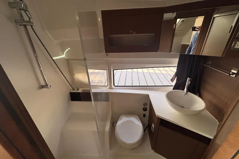 Slide: The Image of Modern bathroom interior of 2023 Beneteau Antares 11 Fly yacht, featuring sleek fixtures. - 18
