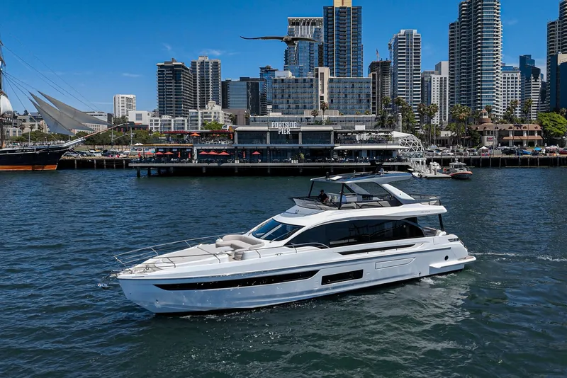 The Image of Azimut Fly 72 yacht cruising near city skyline, 2026 model. - 0