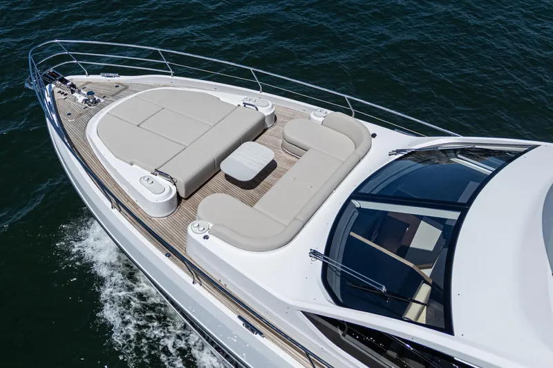 Slide: The Image of Azimut Fly 72 yacht 2026 model, featuring luxurious deck seating on open water. - 18