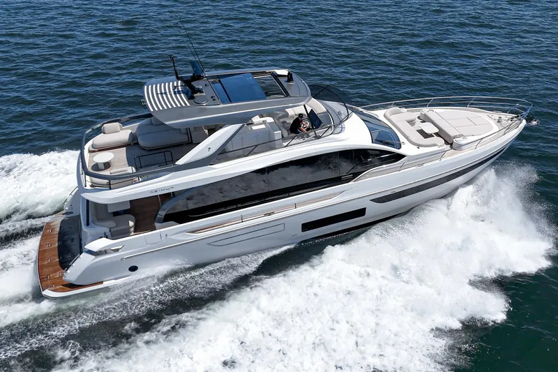 Slide: The Image of 2026 Azimut Fly 72 yacht cruising on open water, showcasing luxury design. - 2
